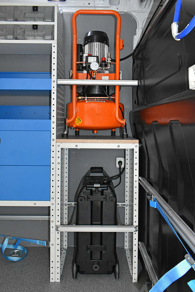 Ecoflow Power Station, compact model, with custom-made frame in a floor compartment with door on Transporter Canada