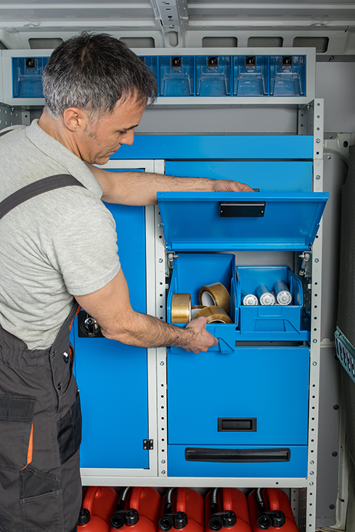 Shelf with plastic containers and Syncro Canada front door